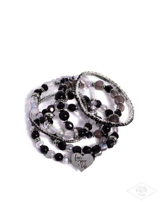 Optimistic Opulence Black stretch bracelet